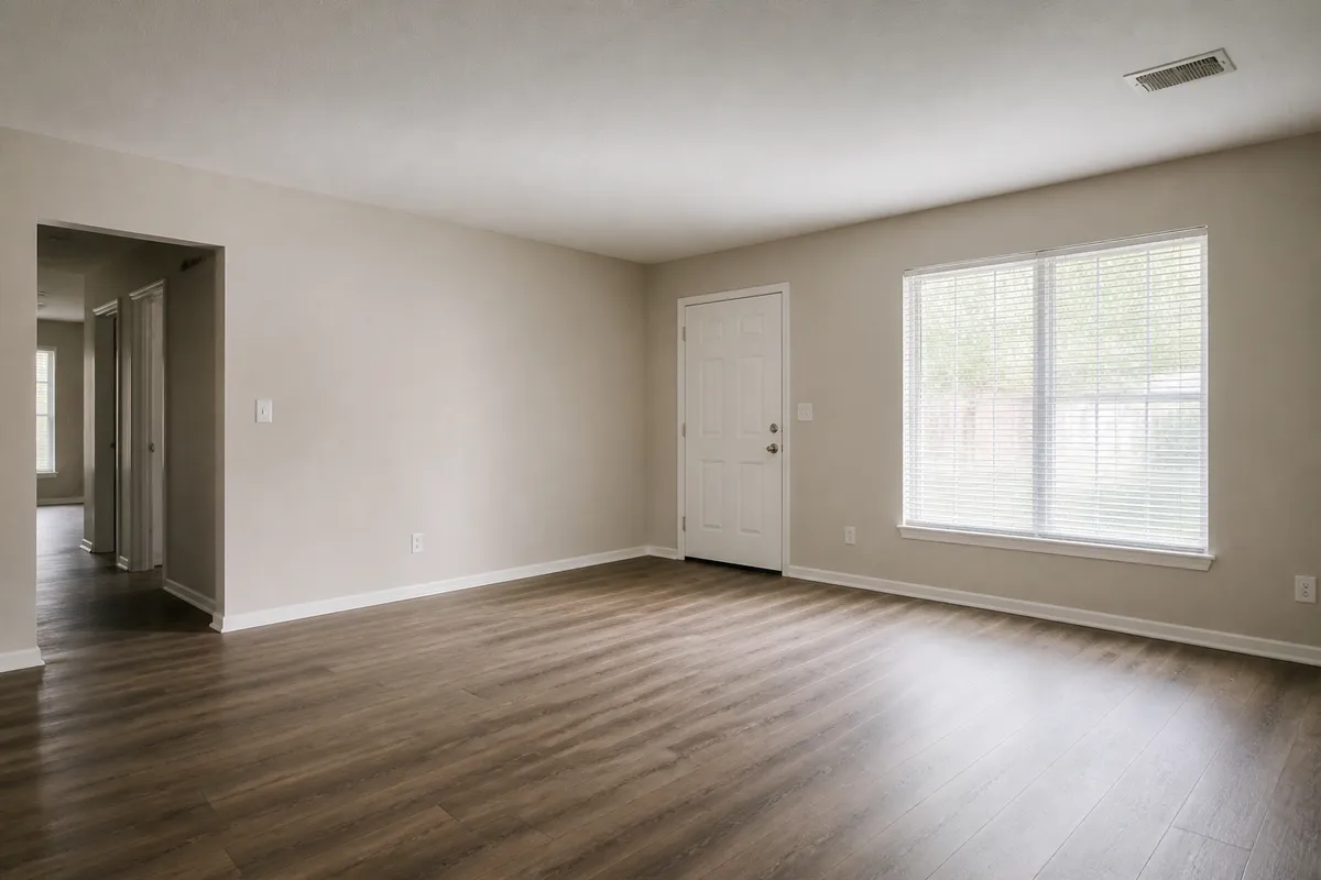 Empty clean living room in a rental home between tenants